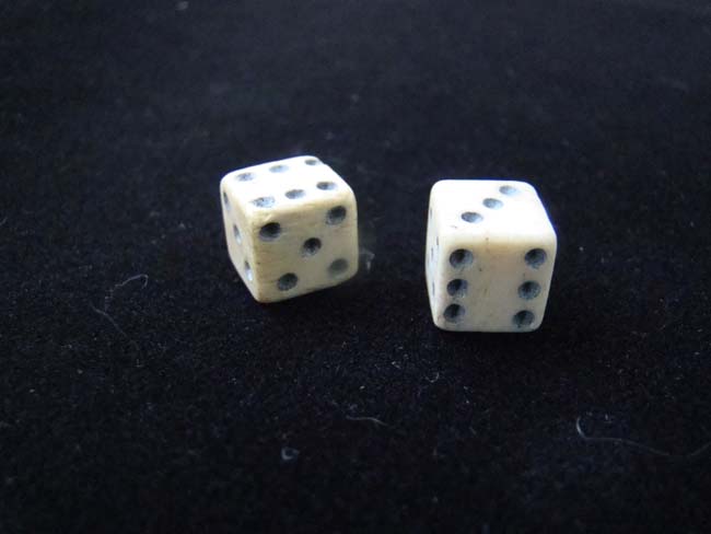A pair of 19th century hand made bone dice circa 1820-1860